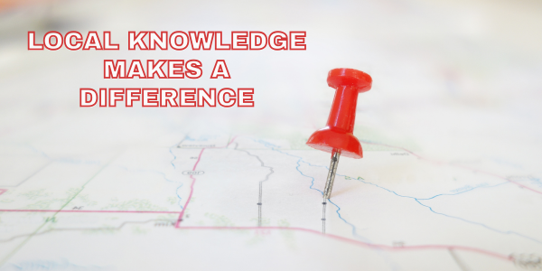 A red pushpin is placed on a map with the text "Local Knowledge Makes a Difference" in bold red letters, emphasizing expertise and insight.